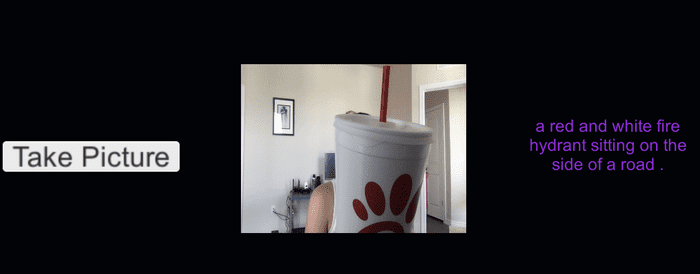A Deep Learning model thinks this is “a red and white fire hydrant sitting on the side of a road” but its my Unity project for taking a webcam picture and doing image caption generation. I’m holding a Chick-fil-a cup to the camera.